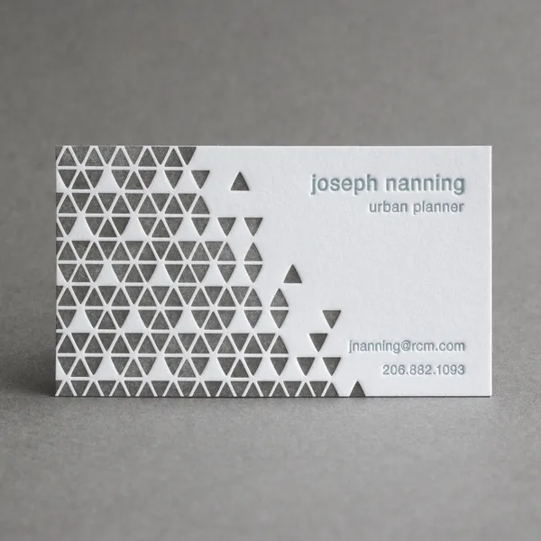 Two-color letterpress business card with a triangle pattern