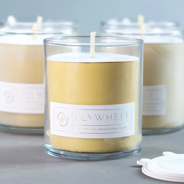Gold foil stamped labels on candle jars